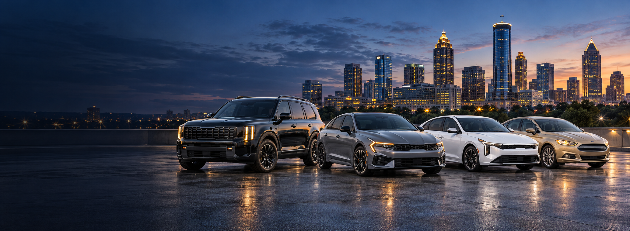 The Seven Fleet Group lineup parked at dusk on a rooftop deck — a black Kia Telluride, a silver Kia K5, a white Kia K4 and a gold Ford Fusion — with the lit downtown Atlanta skyline rising behind them